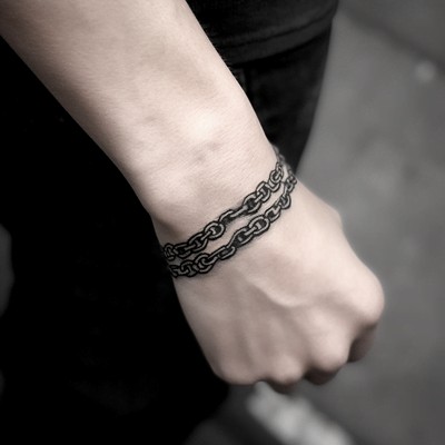 Bicycle Chain in a form of a Band Tattoo on a Wrist